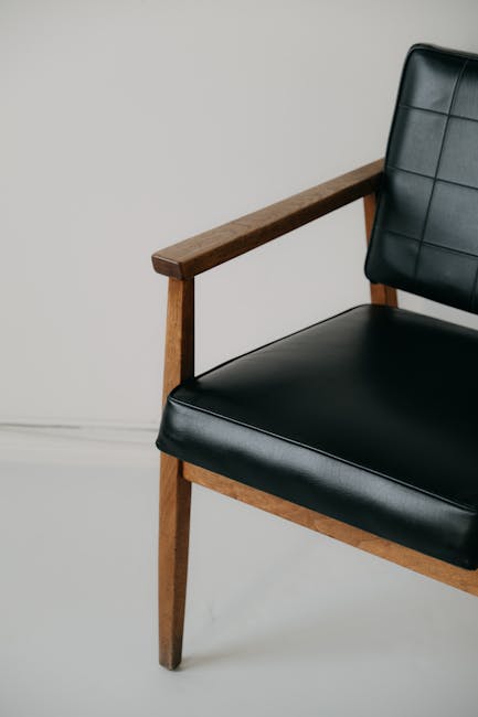 Mid-century modern black leather chair